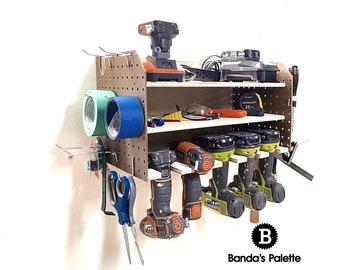 May include: A wooden pegboard tool organizer with multiple shelves and hooks. It holds power drills, tape rolls, scissors, and other tools. The organizer is mounted on a white wall, providing a practical storage solution for a workshop or garage.