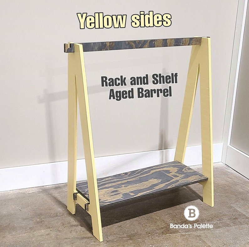 May include: A-frame rack and shelf with yellow sides and a shelf made of aged barrel wood. The text "Yellow sides" and "Rack and Shelf Aged Barrel" are visible on the rack.