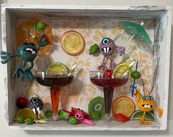 Escena enmarcada de caja de sombras de Happy Hour Frenzy II
