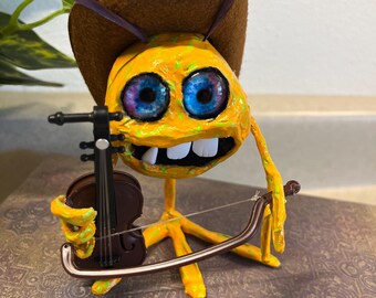 Monstruo vaquero musical hecho a mano