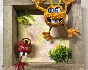 Caja de sombra enmarcada con escena de monstruo (4)