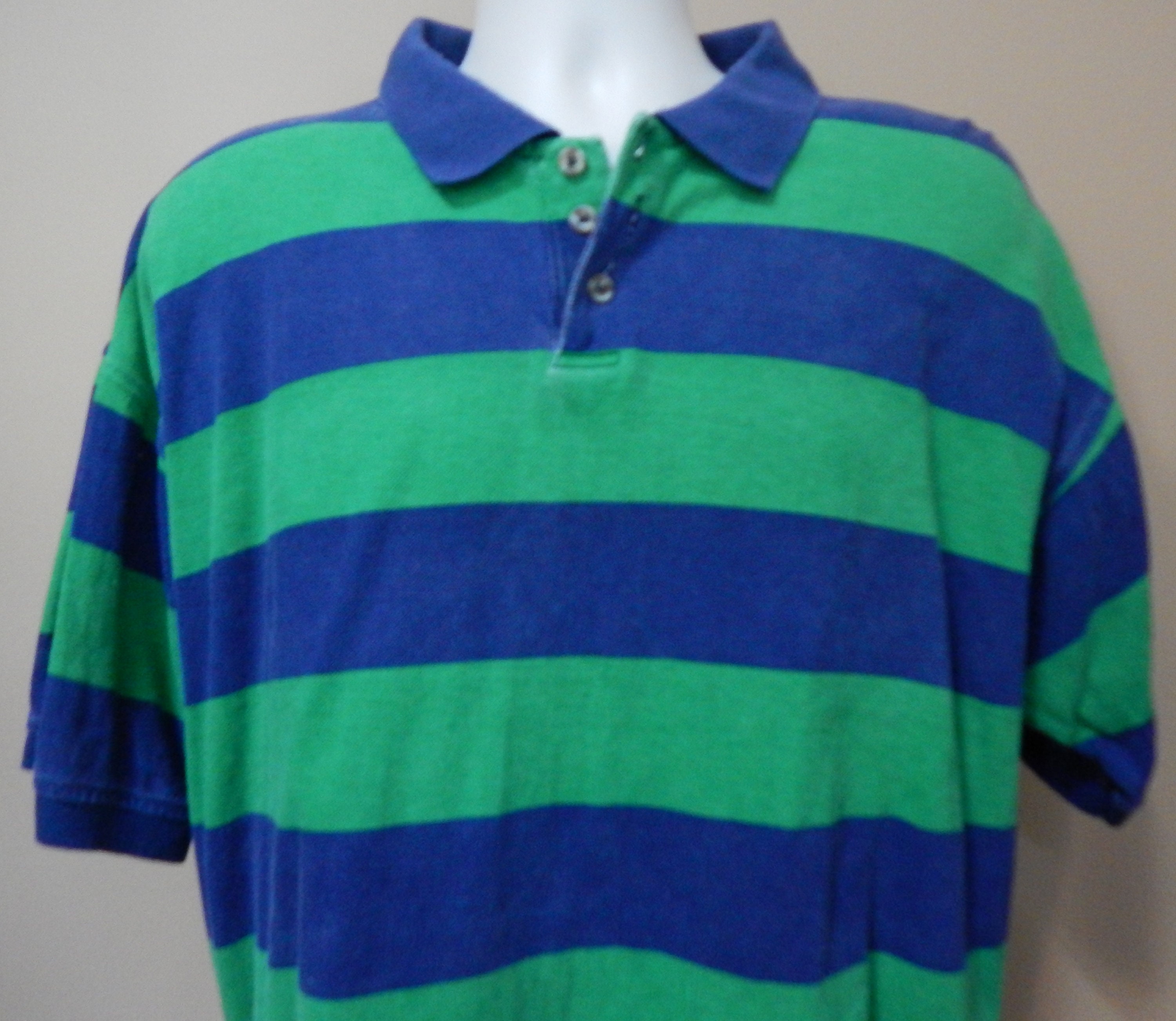 green striped polo shirt