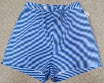 May include: Blue and white striped shorts with a button and zipper closure.
