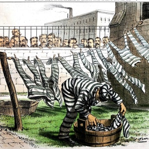 May include: A black and white illustration of a man in a striped prison uniform washing clothes in a bucket. The man is standing in front of a brick wall with a fence and a building in the background. There are several pairs of striped trousers hanging on a clothesline.