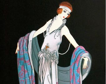 May include: A woman in a white dress with a blue and purple patterned shawl. She is wearing a headband and a pearl necklace. The background is black.
