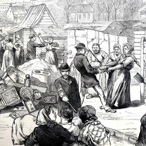 May include: A black and white engraving depicting a chaotic scene with people gathered in a crowded outdoor space. There are several wooden structures in the background, and the foreground shows a pile of debris, including furniture and other household items.
