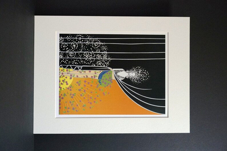 May include: A black and white print of a woman lying on a bed of orange and yellow flowers. The woman is surrounded by a white, starry sky. The print is framed in a white mat.
