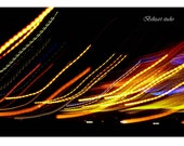 Art mural Photographie abstraite de lumière, feux incandescents, éclats rouge, jaunes, bleus sur noir, lignes brillants, cadeau