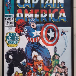 May include: Captain America comic book cover featuring Captain America in his red, white, and blue costume, standing with other superheroes, including Black Panther, Iron Man, and Thor. The cover text reads "CAPTAIN AMERICA" and "BIG PREMIERE ISSUE!"