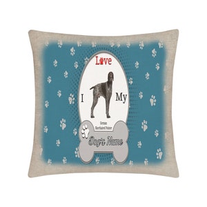 May include: A blue and white throw pillow with a paw print pattern. The pillow features a white oval with a German Shorthaired Pointer dog inside. The text "I Love My Dog's Name" is printed on the pillow.