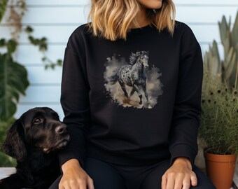 May include: A black sweatshirt with a watercolor design of a spotted horse running through a field of dust.