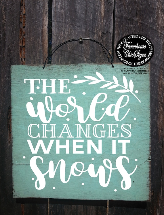 The World Changes When It Snows Rustic Sign