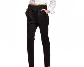 Black pants, folded front side, pockets