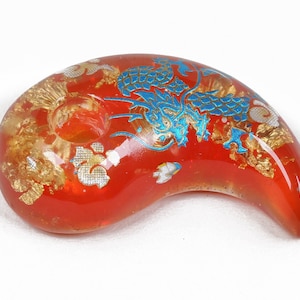 Hello from Japan.
This is a handmade magatama with Orgonite power. It is a wonderful piece of art created by skilled craftsmen as a result of very precise work.
This Magatama will serve as your amulet by its Orgonite power, if you so believe.