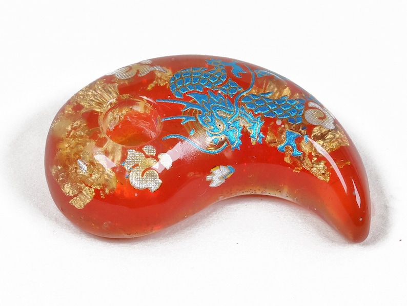 Hello from Japan.
This is a handmade magatama with Orgonite power. It is a wonderful piece of art created by skilled craftsmen as a result of very precise work.
This Magatama will serve as your amulet by its Orgonite power, if you so believe.