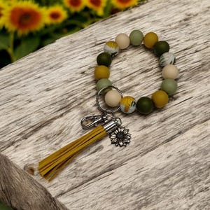 Llavero de pulsera con girasol