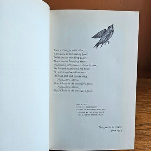 May include: A black and white illustration of a bird singing. The text below the image reads "I saw a stranger yestere'en; I put food in the eating place, Drink in the drinking place, Music in the listening place; And in the sacred name of the Triune He blessed myself and my house My cattle and my dear ones. And the lark said in her song, Often, often, often, Goes Christ in the stranger's guise. Often, often, often, Goes Christ in the stranger's guise. OLD GAELIC RUNE OF HOSPITALITY FOUND BY KENNETH MACLEOD COPIED BY ME FROM BOOK IN SKEABOST HOUSE, SKYE Marguerite de Angeli JUNE 1954"