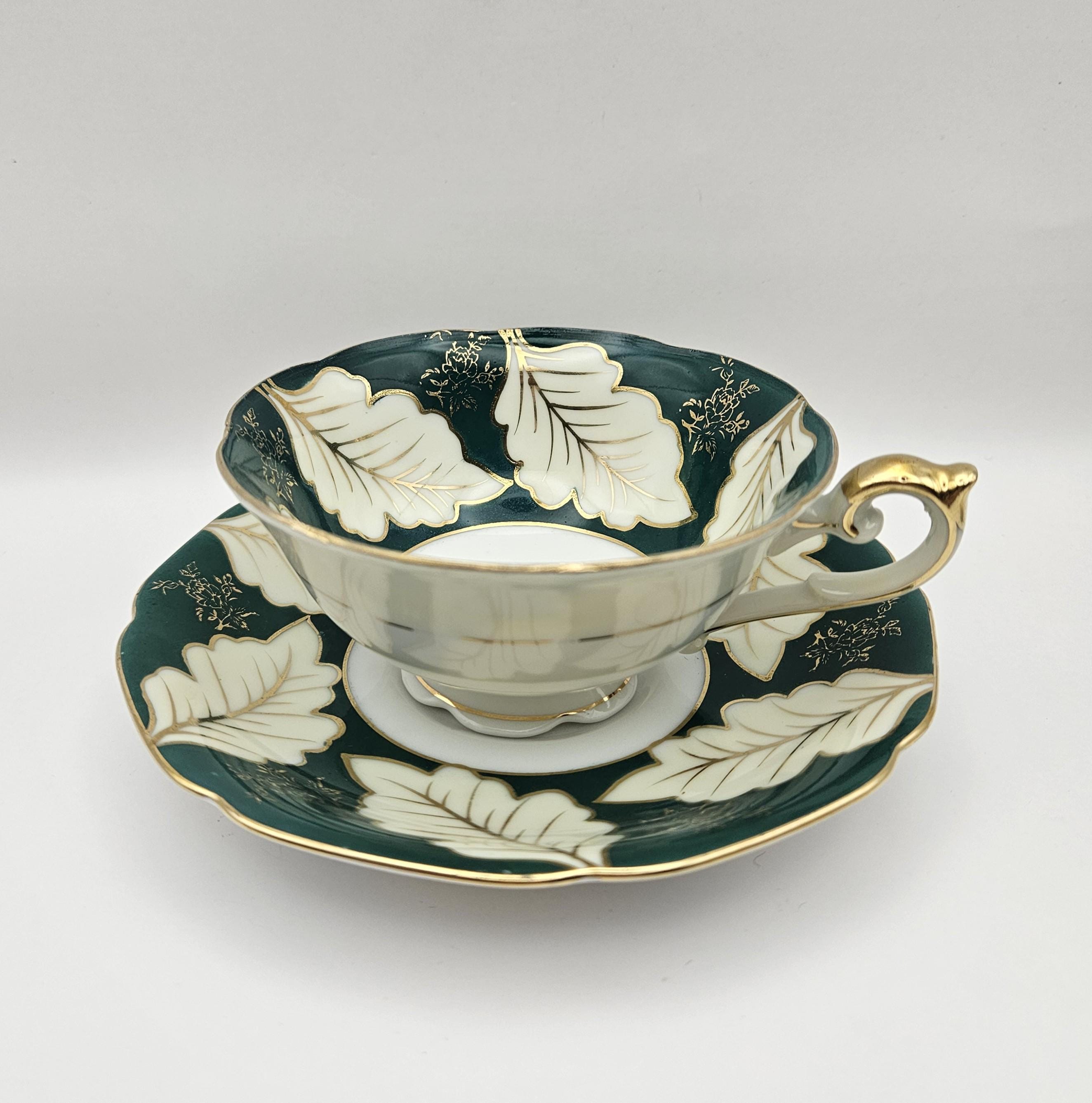 1950's Ucagco China Teacup and Saucer - White and Gold Leaves on
