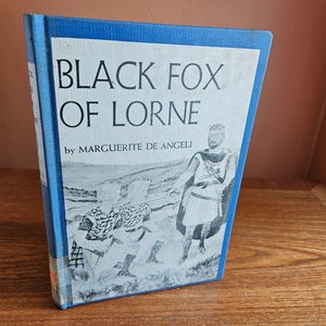 May include: A blue book cover with the title "Black Fox of Lorne" by Marguerite de Angeli. The cover features a black and white illustration of a man in a kilt and two other figures.
