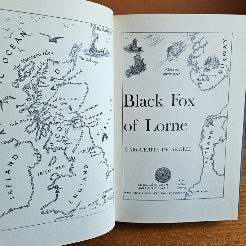 May include: A black and white illustration of a map of Scotland and surrounding areas. The map shows the location of the "Firth of Lorne" and the text "Black Fox of Lorne" by Marguerite de Angeli. The book cover also includes the text "The Jeweled Talisman of Harald Redbeard" and "To the Frankish Country."