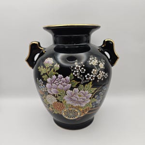 Black Porcelain Vase Trimmed in Gold Decorated with Flowers in a Wagon Made in Japan