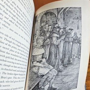 May include: A black and white illustration of a man sitting in a church with a group of monks praying in the background. The man is wearing a tunic and leggings. The monks are wearing robes. The illustration is drawn in a realistic style.