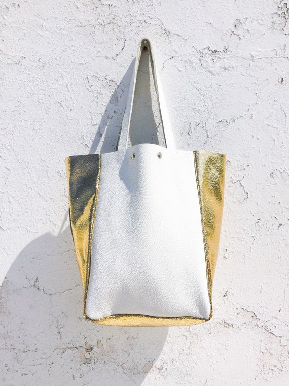 white and gold tote bag