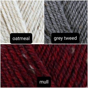 May include: Close-up of three yarn skeins in the colors oatmeal, grey tweed, and mull.