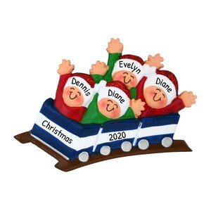 May include: A blue and white train ornament with four figures riding on top. The figures are wearing red and green hats with white trim and have smiling faces. The train has the words "Christmas" and "2020" on it. The figures are labeled "Dennis", "Diane", "Diane", and "Evelyn".
