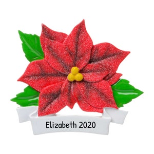 May include: Red poinsettia Christmas ornament with a white banner that reads "Elizabeth 2020".