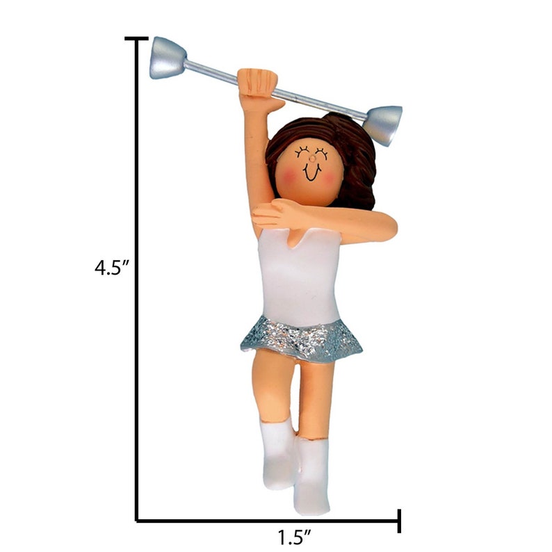 May include: A figurine of a baton twirler, 4.5 inches tall and 1.5 inches wide. The figure is wearing a white leotard with a silver glitter skirt and white boots. She is holding a silver baton above her head.