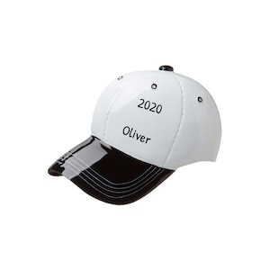 May include: White baseball cap with a black brim. The cap has the text "2020" and "Oliver" printed on the front.