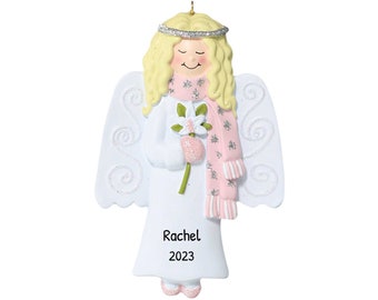 May include: White angel Christmas bauble with blonde hair, pink scarf, and a white flower. The bauble is personalised with the name "Rachel" and the year "2023".