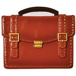 May include: A brown leather briefcase with gold-toned hardware and stitching. The briefcase has a top handle and a clasp closure.