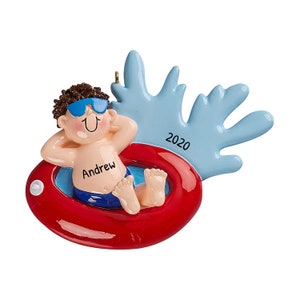 May include: A red and white inflatable ring with a boy wearing blue swimming trunks and sunglasses floating in it. The boy is smiling and has brown hair. The ring is decorated with blue water splashes and the year 2020. The boy's name, Andrew, is written on the ring.