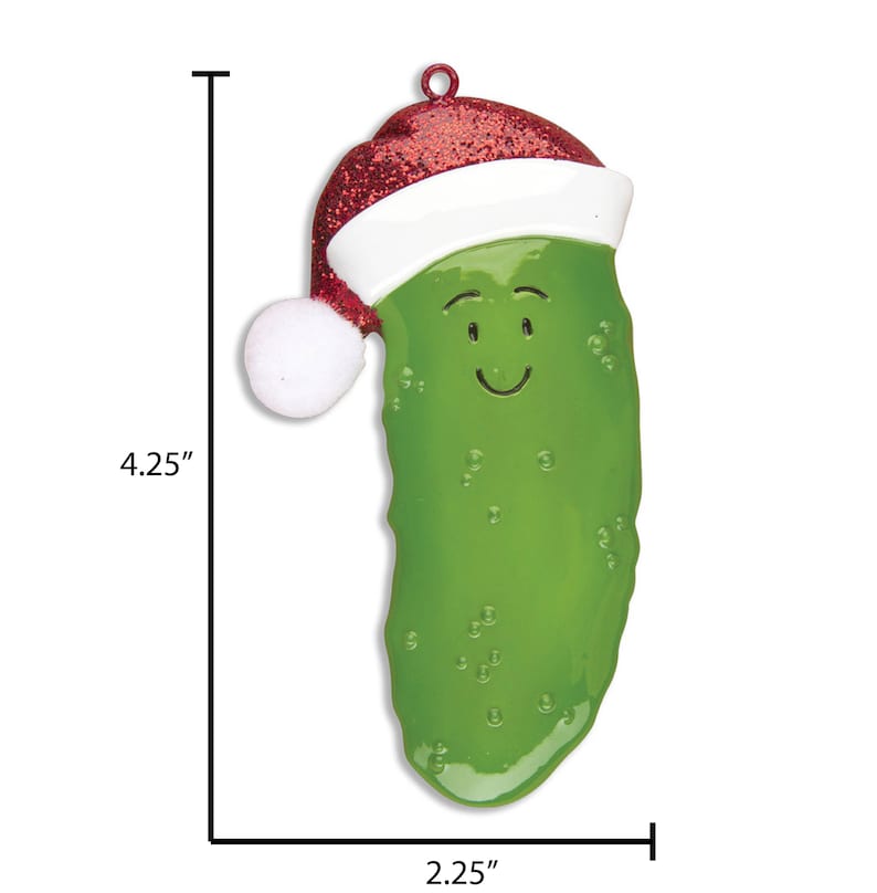 Puede incluir: Un adorno navide&ntilde;o de pepinillo verde con un gorro de Pap&aacute; Noel rojo y blanco. El pepinillo tiene una cara sonriente y mide 10,8 cm de alto y 5,7 cm de ancho.