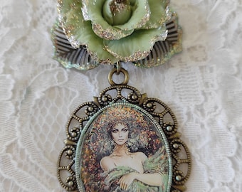 Necklace Viviane the fairy dressed in green and gold in the forest of Avalon a rose offered by Merlin as a talisman, fairy gift
