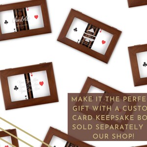 May include: Wooden card keepsake boxes with custom text and playing card suit symbols. The boxes are brown with a clear front, and the text includes names and phrases. The image also includes the text: "MAKE IT THE PERFECT GIFT WITH A CUSTOM CARD KEEPSAKE BOX! SOLD SEPARATELY IN OUR SHOP!"