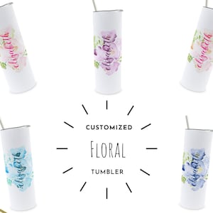 May include: Four white stainless steel tumblers with floral designs and personalized names. The tumblers are all the same size and have a straw. The text on the tumblers reads "Customized Floral Tumbler".