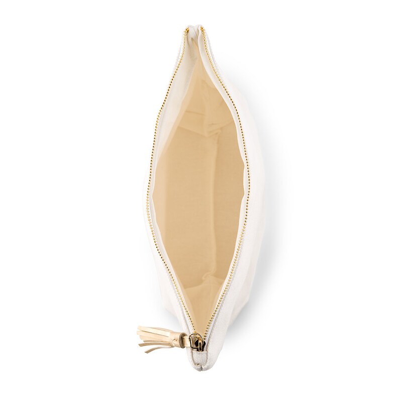 May include: White zippered pouch with a tassel pull. The pouch is open and the inside is beige.