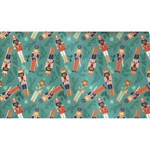May include: A teal green wrapping paper with a repeating pattern of nutcracker soldiers in various poses. The nutcrackers are wearing red, blue, and gold uniforms with black hats and white faces. The background is filled with green pine branches.