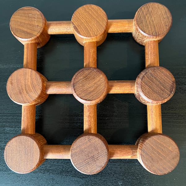 Danish mid century modern trivet make of teak wood - marked Nissan Danmark