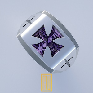 May include: A silver ring with a purple gemstone set in a cross shape.