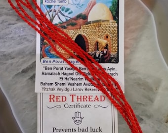 May include: Red string bracelet with a certificate that says "Kabbalah Red Strings against evil eye" and "Prevents bad luck & Evil-eye". The certificate also has a picture of the Rachel Tomb and the Western Wall in Jerusalem.