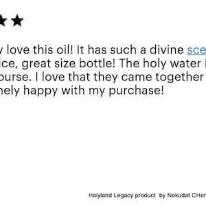 May include: Five-star review of a product with the text "Absolutely love this oil! It has such a divine scent.It was a great price, great size bottle! The holy water is a great size for a purse. I love that they came together as a set. I am extremely happy with my purchase!"