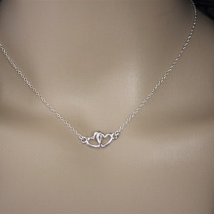 Minimalist Silver sterling Entwined hearts necklace