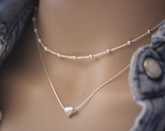 Collier minimaliste multi-rangs en argent massif double chaine et perle coeur