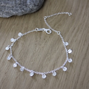 Sterling silver bracelet with mini hammered medals