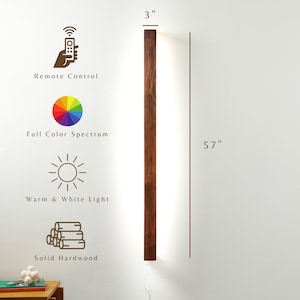 Puede incluir: L&aacute;mpara de pared LED vertical de madera, de 7,6 cm de ancho y 144,8 cm de alto, con luz c&aacute;lida y blanca. Incluye mando a distancia, espectro de color completo y madera maciza.