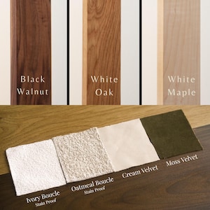 K&ouml;nnte beinhalten: Drei vertikale Holzmuster mit der Beschriftung Black Walnut, White Oak und White Maple sowie vier Stoffmuster mit der Beschriftung Ivory Boucle Stain Proof, Oatmeal Boucle Stain Proof, Cream Velvet und Moss Velvet auf einer Holzoberfl&auml;che.